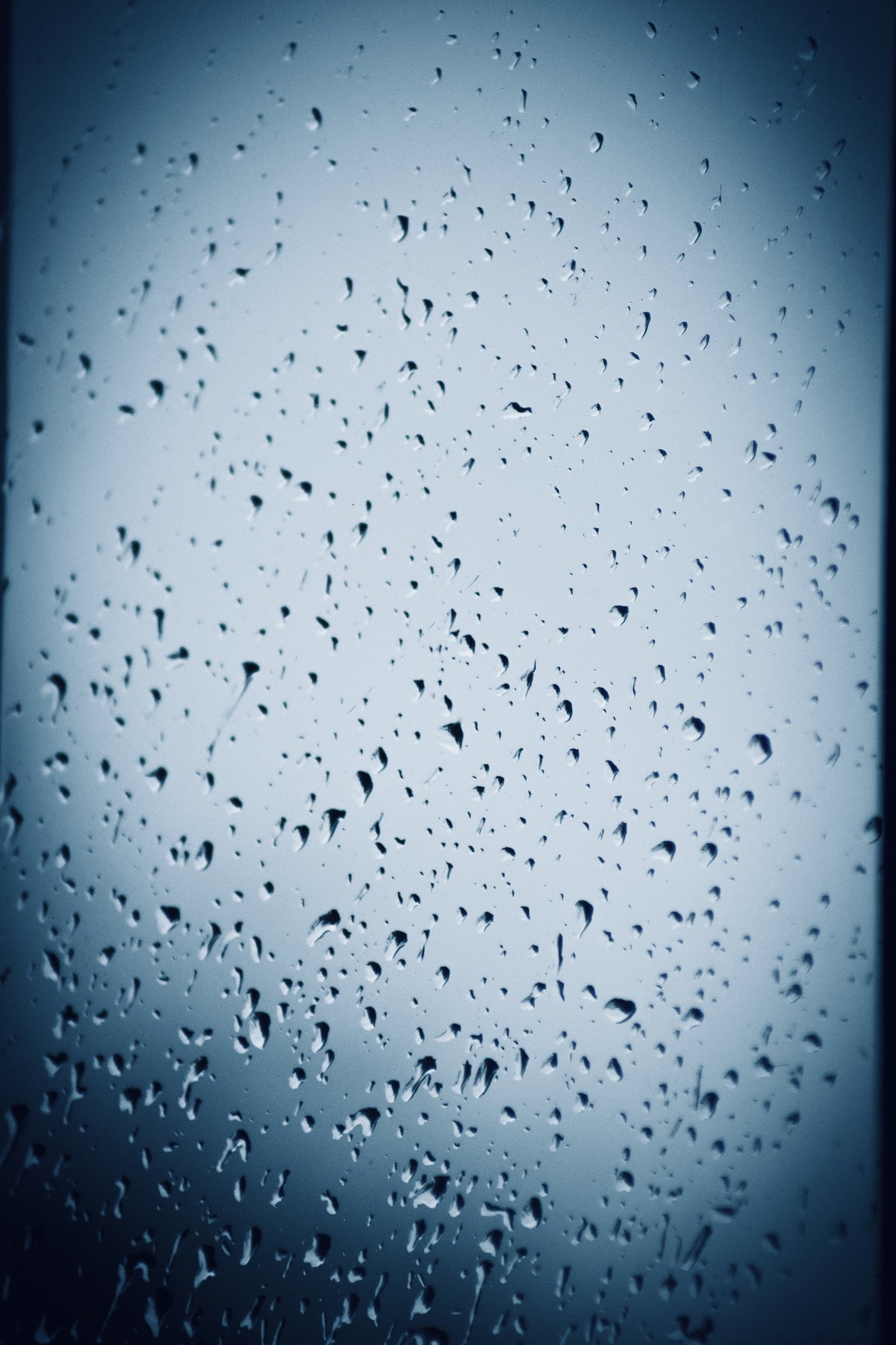 Silent Rainfall, Rain falling on still water, original fine-art photograph
