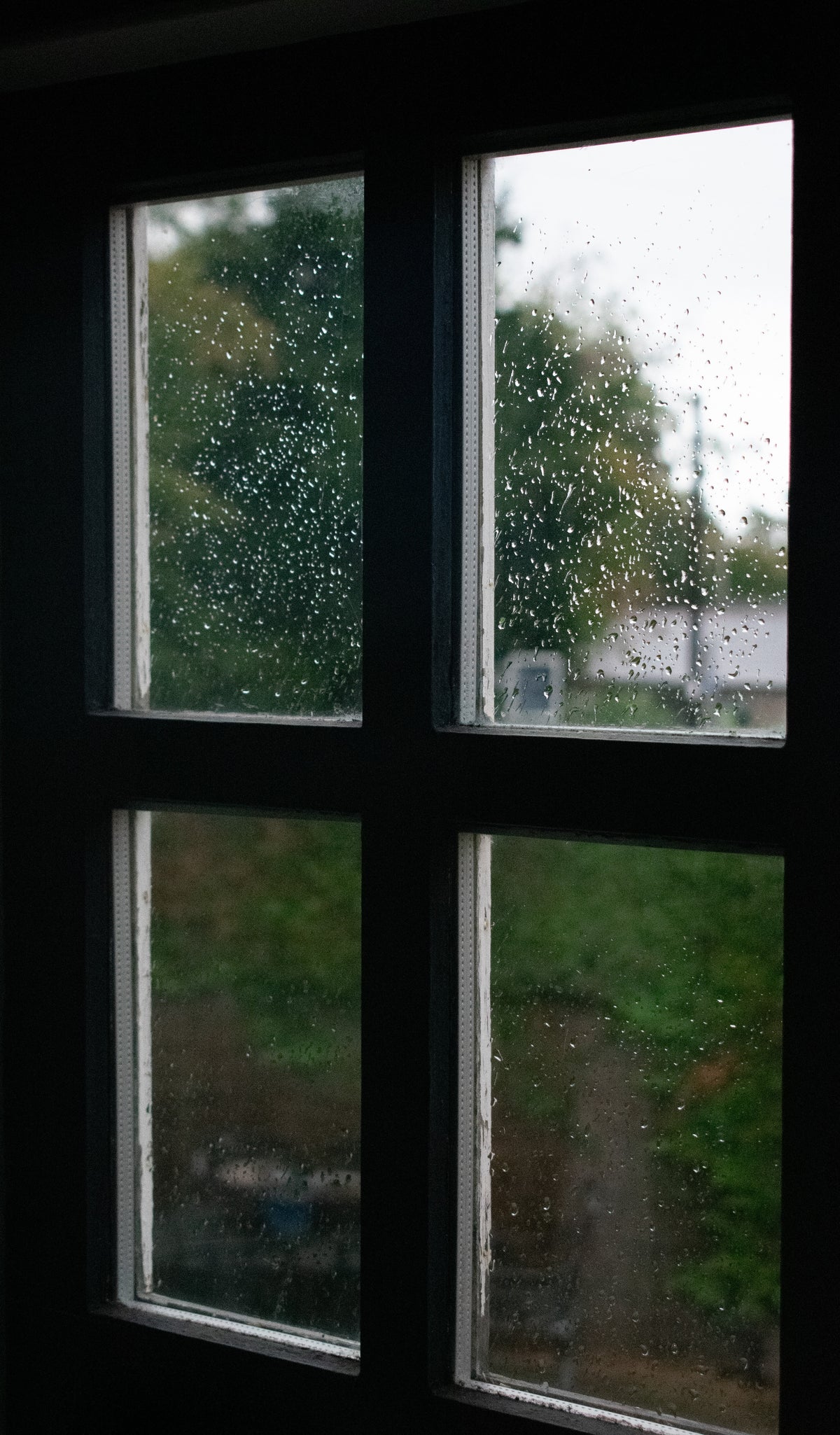 Rainy Windows, Raindrops on a window, blurred city, original fine-art photograph